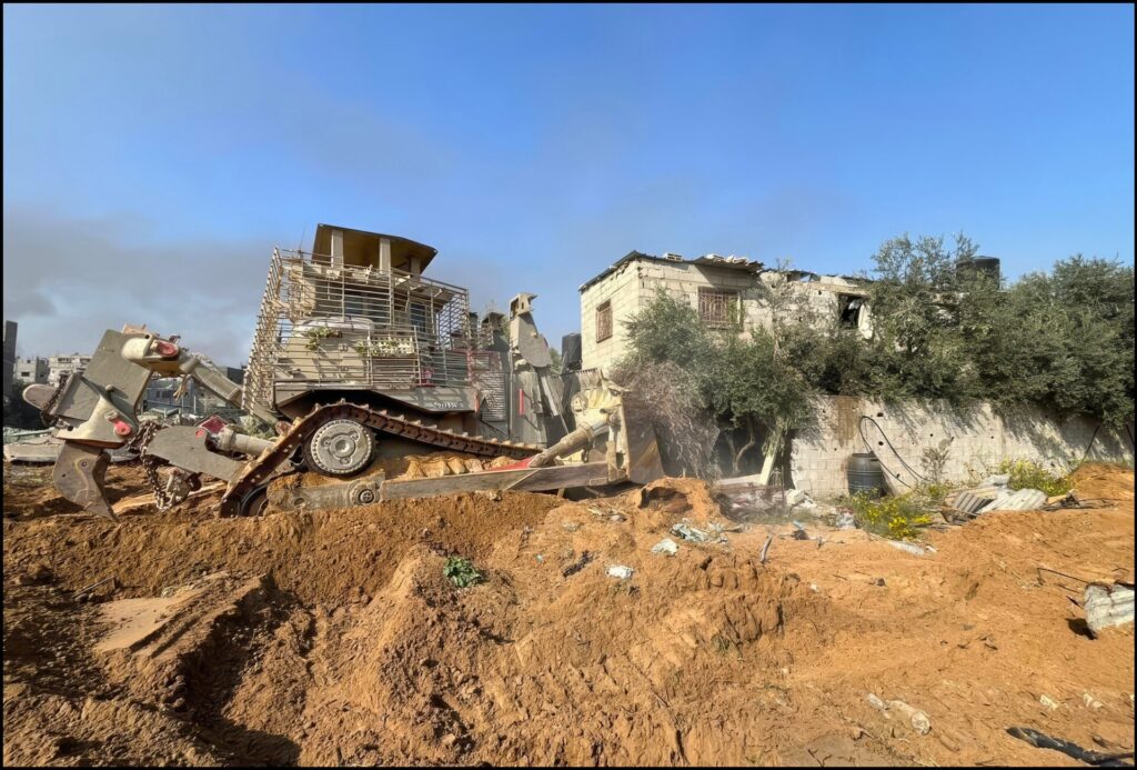 Excavadora militar D9 en ruinas de Gaza, en el contexto de la guerra.